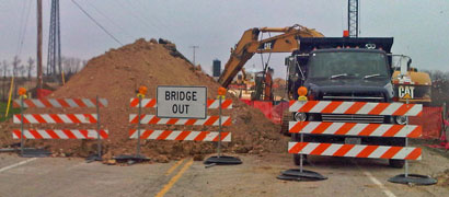 Traffic barriers block road for bridge removal